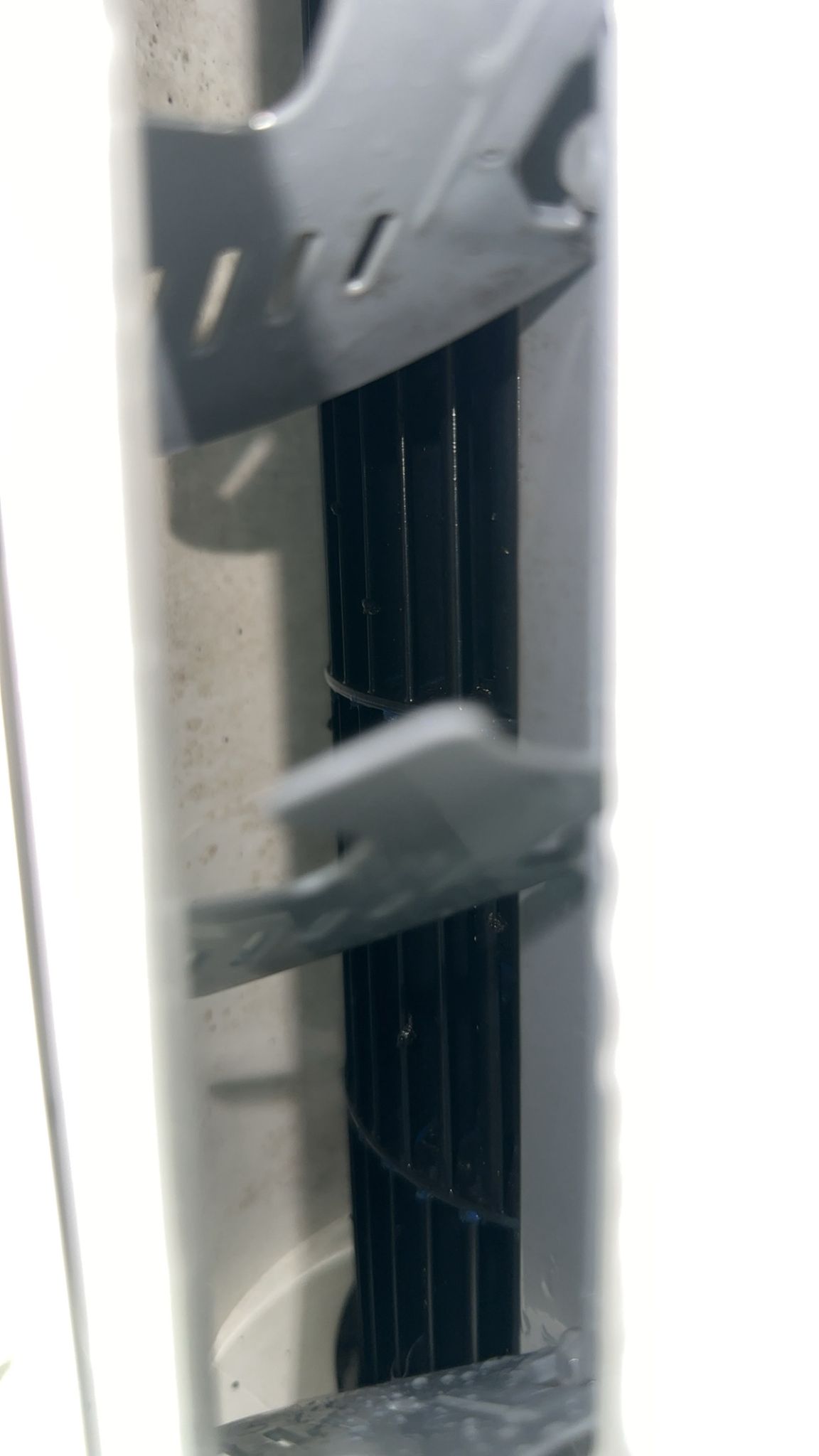Toptech Air technician deep cleaning air conditioning evaporator coils and blower fan
