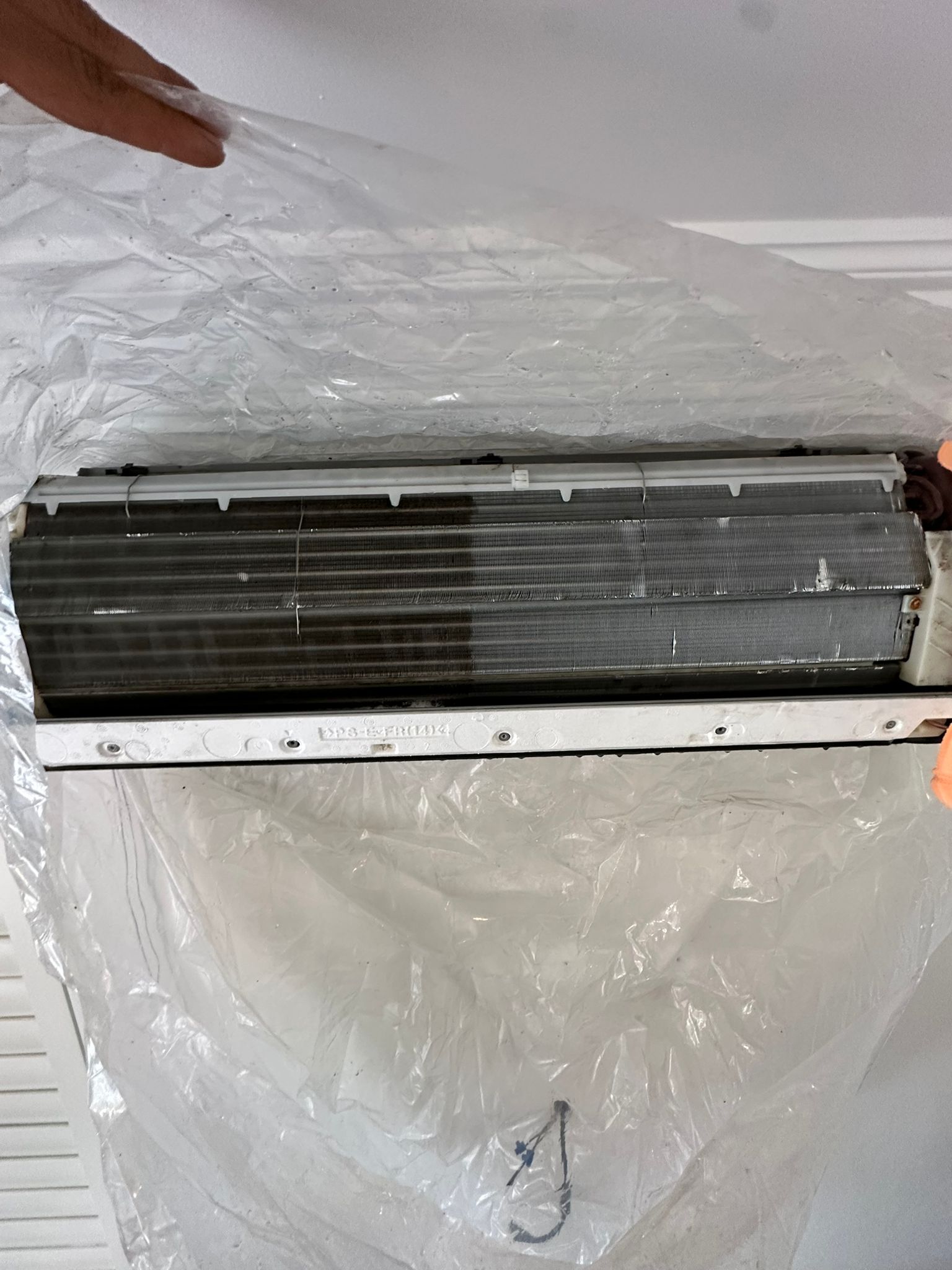 Interior of AC unit showing mould and dust build-up before Toptech Air deep clean service