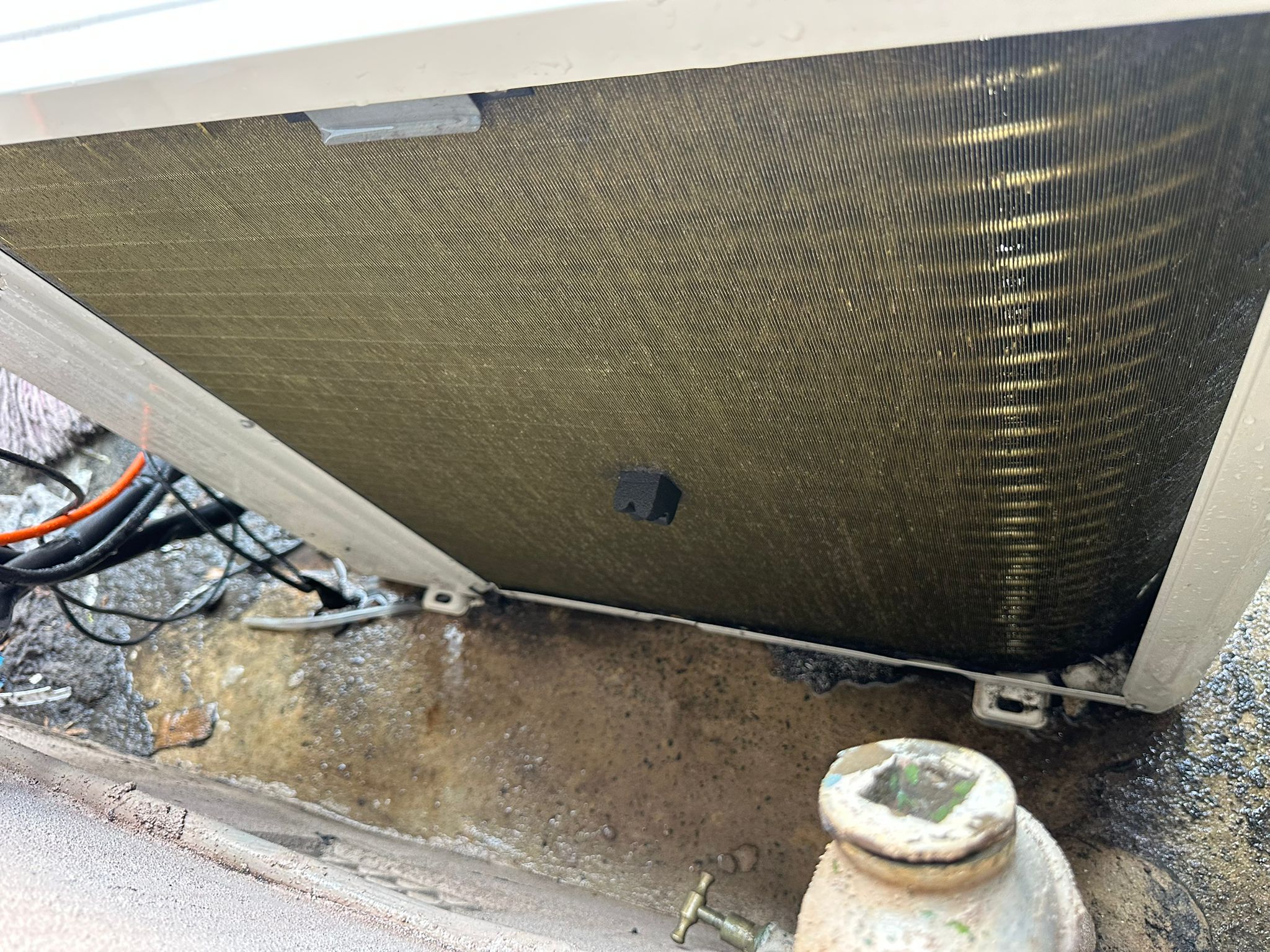 Toptech Air technician performing a professional air conditioner installation in a Sydney home
